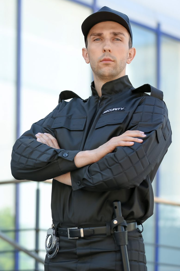 A security guard posing